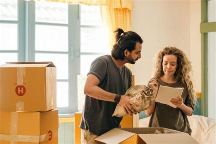 Can a married couple buy a house under one name?