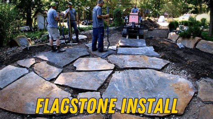 Can you lay flagstone on a concrete slab?