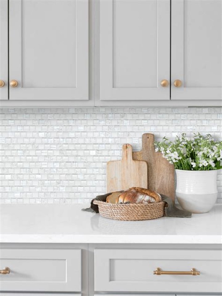 Can you tile over wood cabinets?