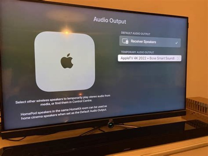 How do I change my default Audio output on Apple TV?
