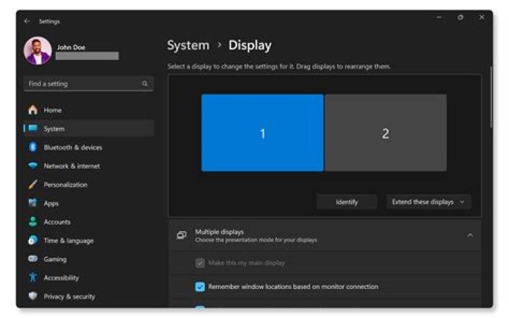 How do I change my TV display settings?