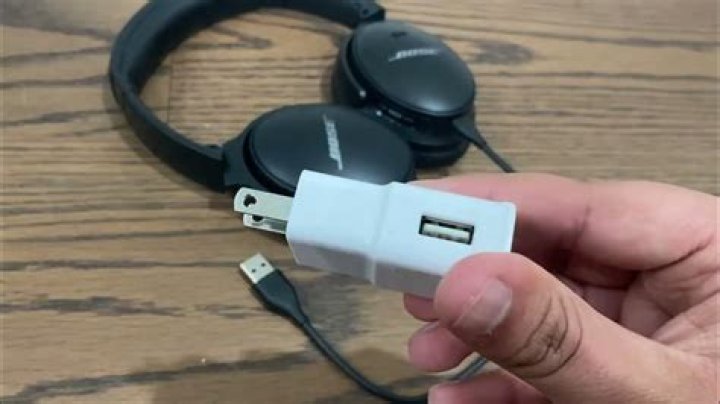 How do I charge my Bose Quiet Comfort headphones?