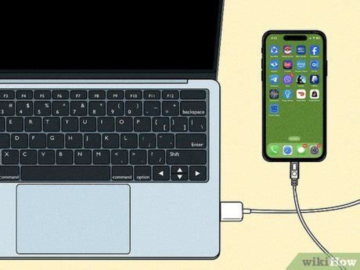 How do I connect my iPhone to a wired computer?