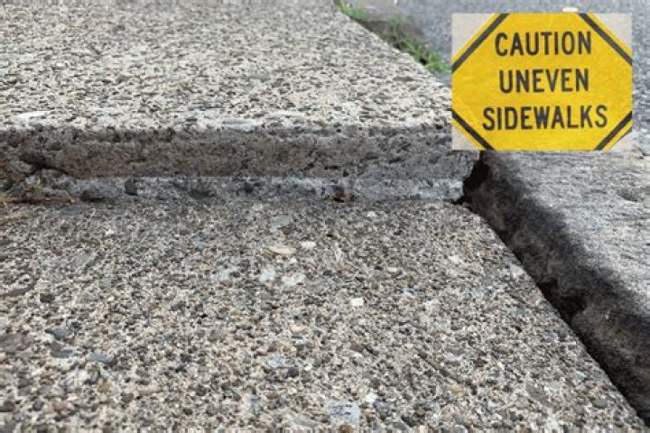 How do I fix an uneven paver walkway?