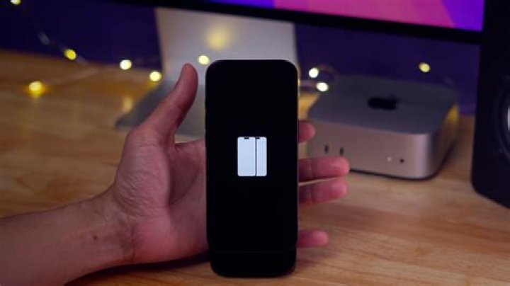 How do I get my iPhone to play sound on both speakers?