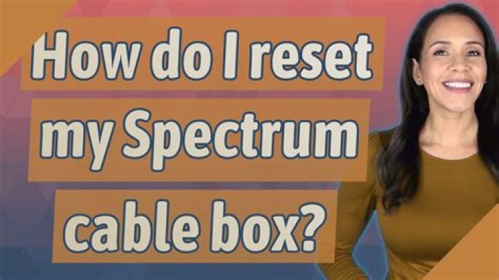 How do I reset my Spectrum cable box to factory settings?