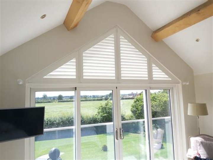 How do you cover a triangle window?