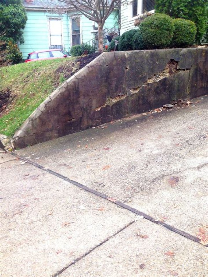 How do you fix a crumbling retaining wall?