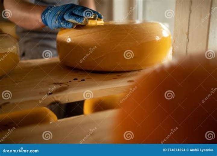 How do you get wax coating off cheese?