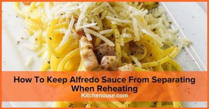 How do you keep cheese sauce from separating when reheating?