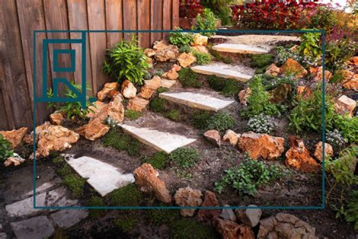 How do you landscape a backyard with a slope?