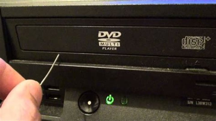How do you open a stuck DVD player?