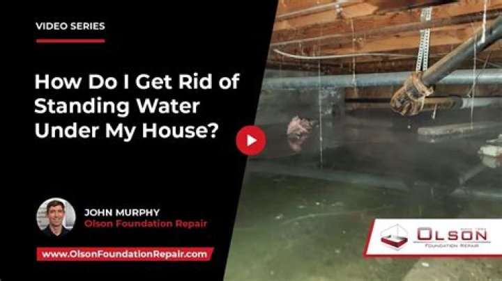 How do you remove standing water from concrete?