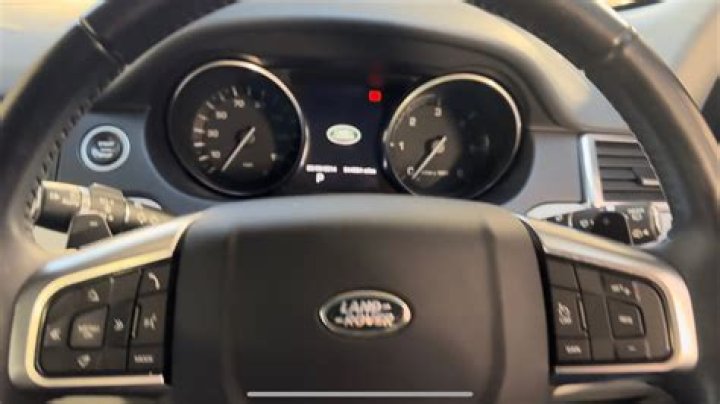 How do you reset a Land Rover Discovery Sport radio?
