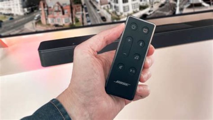 How do you sync a Bose Soundbar remote?