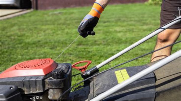 How do you unstick a lawn mower pull cord?