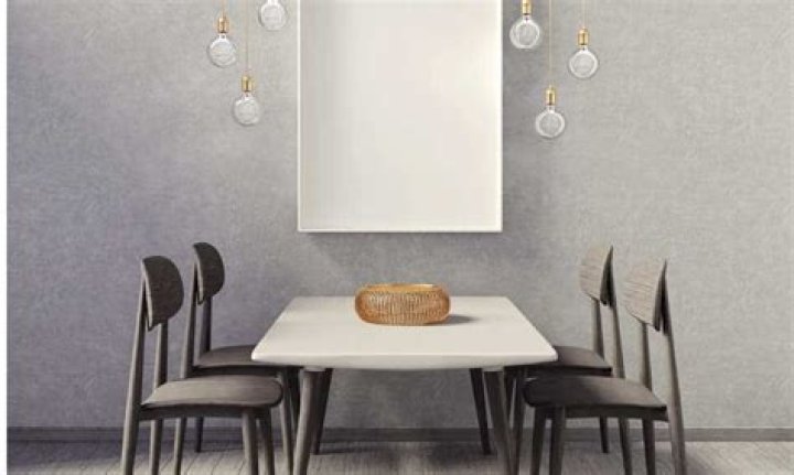 How high should a light be above a dining table?