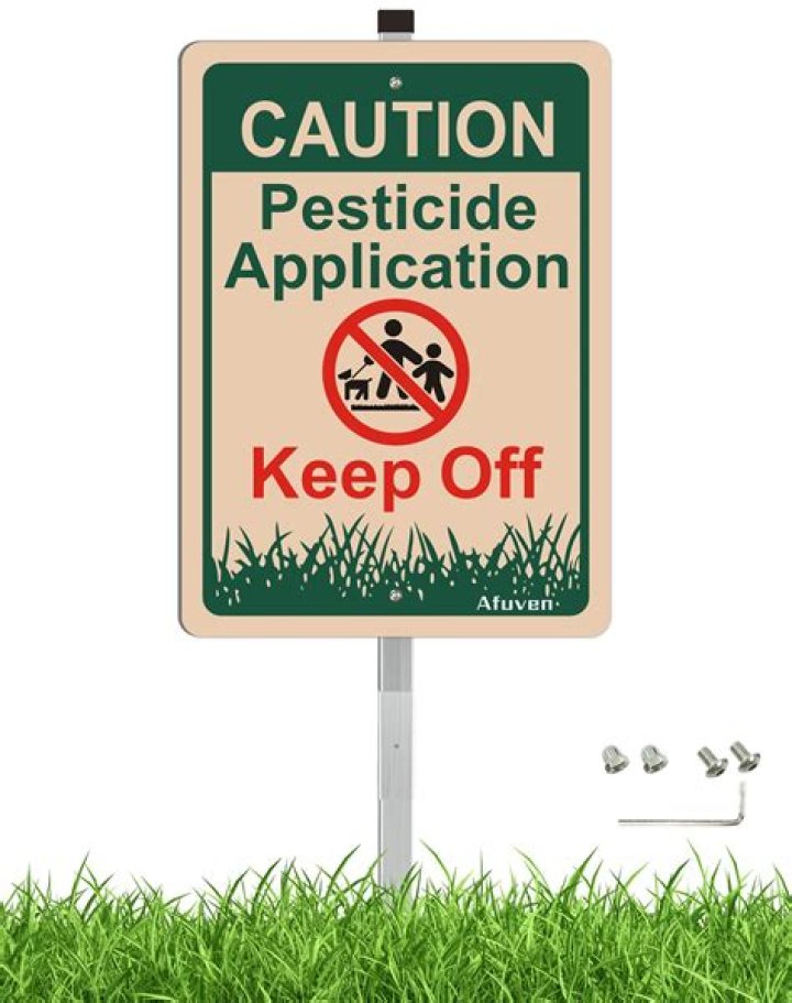 How long should you stay off grass after pesticide?