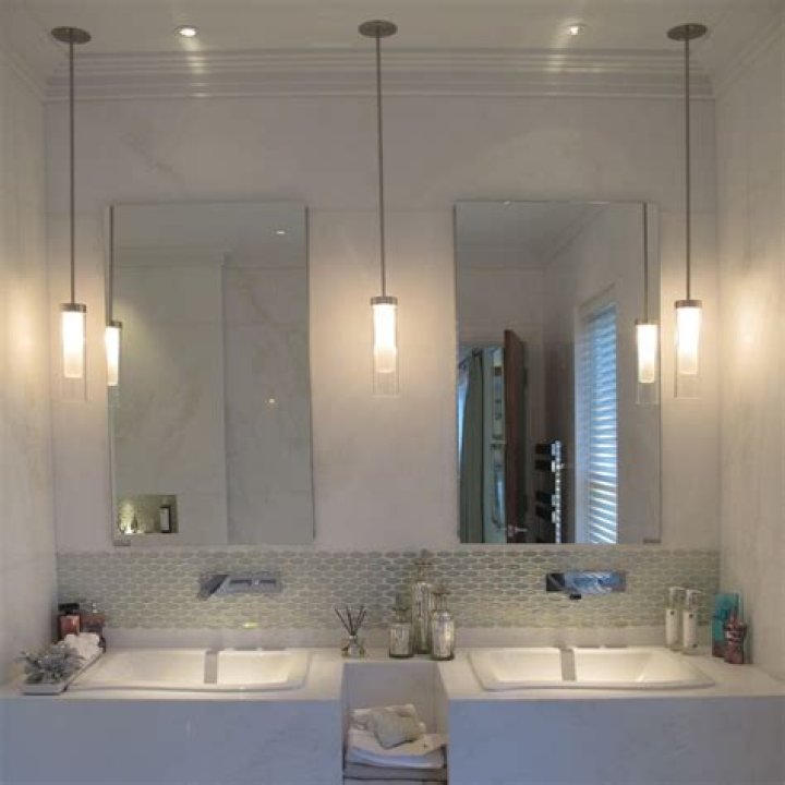 How low should pendant lights hang in bathroom?