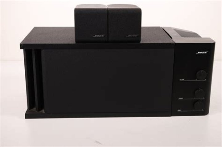 How much does a Bose Acoustimass module weigh?