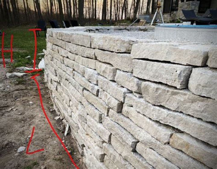How much does it cost to dry stack a stone wall?