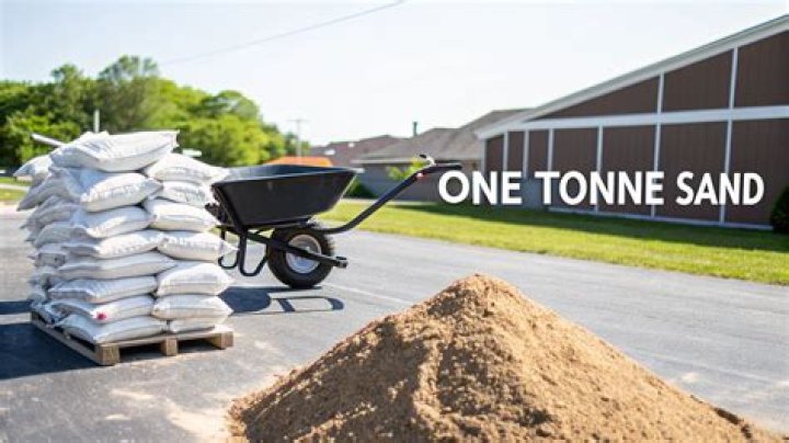 How much does one ton of sand weigh?