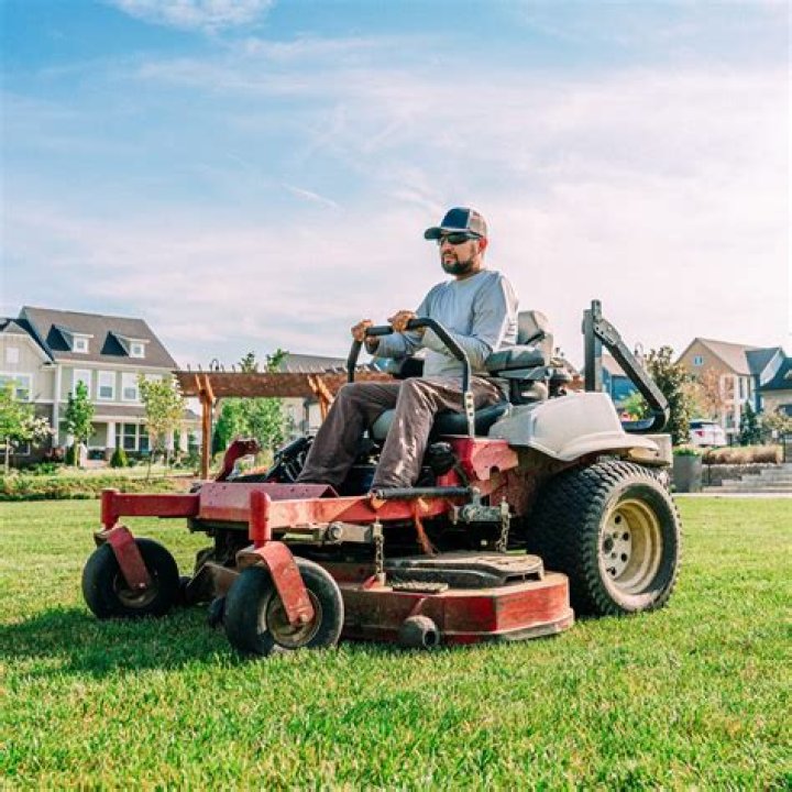 How much should you pay someone to mow your lawn?