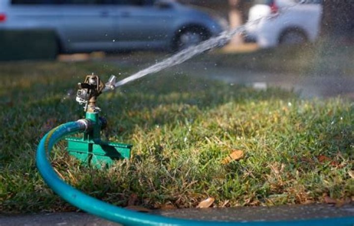 How much water comes out of a sprinkler per minute?