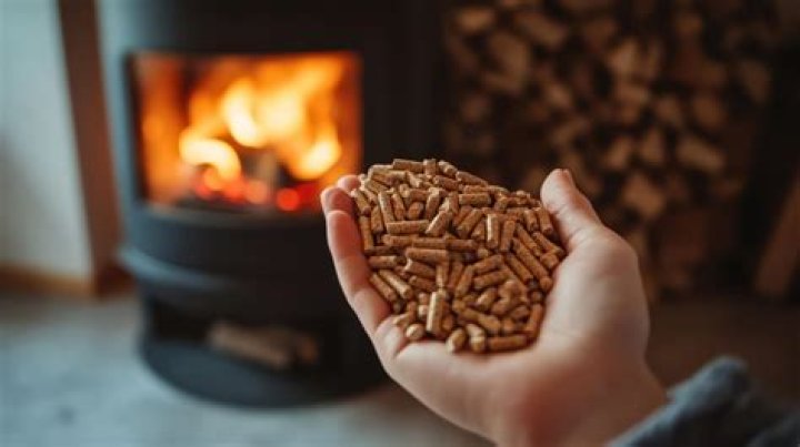 Is it cheaper to heat with wood pellets or natural gas?