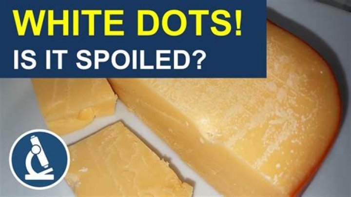 Is it normal for cheddar to have white spots?