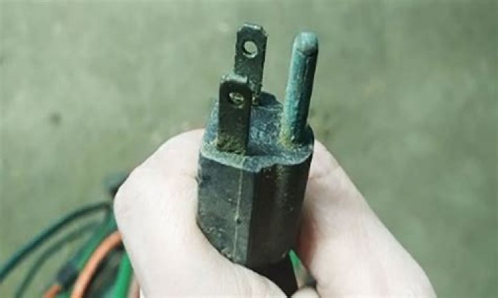 Is it safe to plug in a corroded plug?