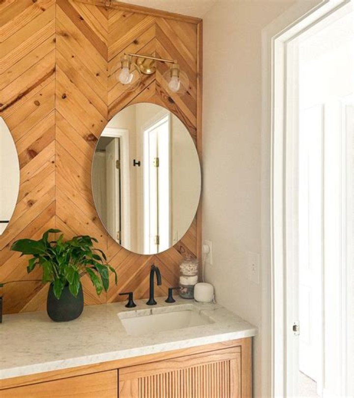 Should vanity light be centered over sink or vanity?