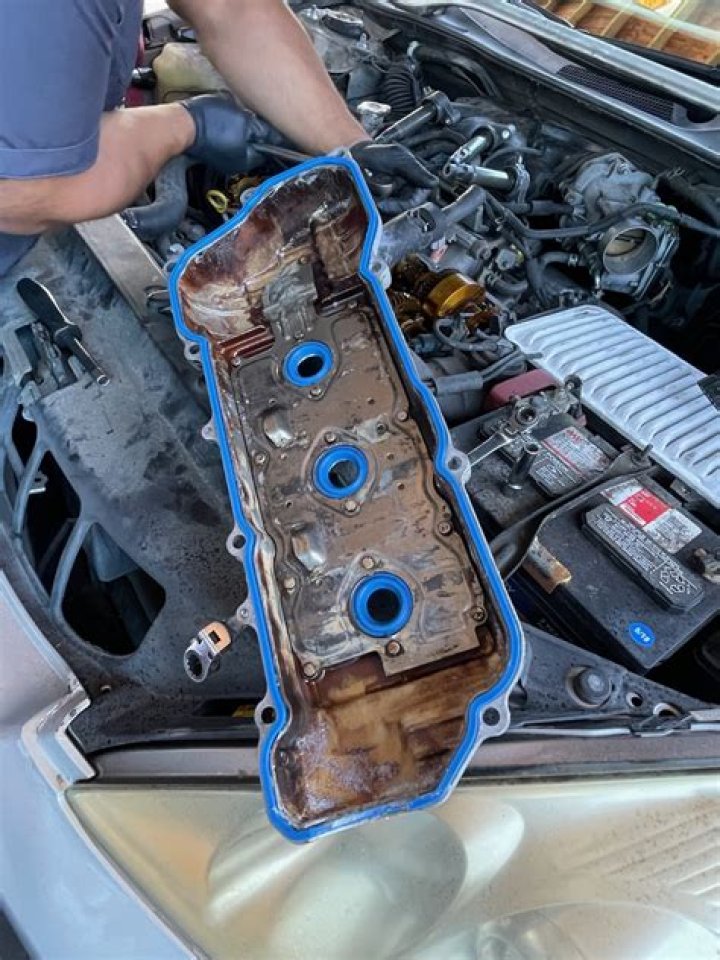 What causes an oil leak in a Toyota Camry?