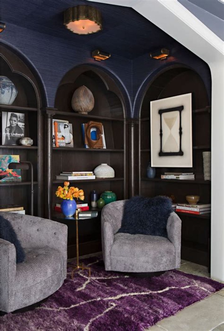 What color furniture goes with navy blue carpet?