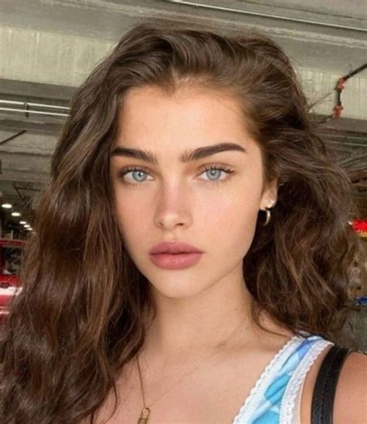 What color goes best with brown hair and blue eyes?