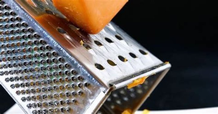What is the purpose of a cheese grater?