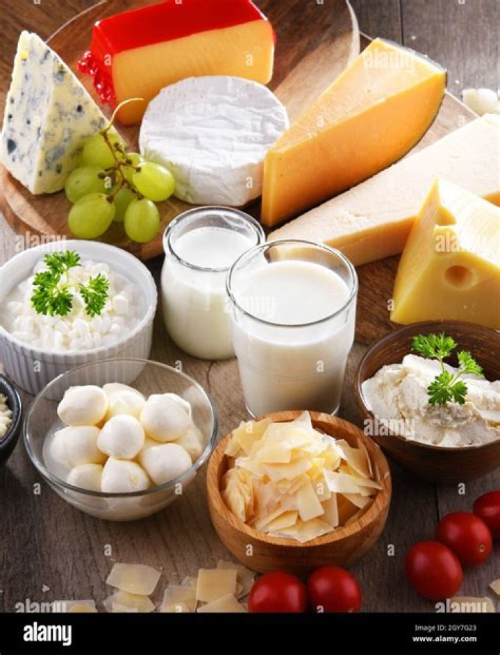 Where does the sour taste come from in food such as cheese and yogurt?
