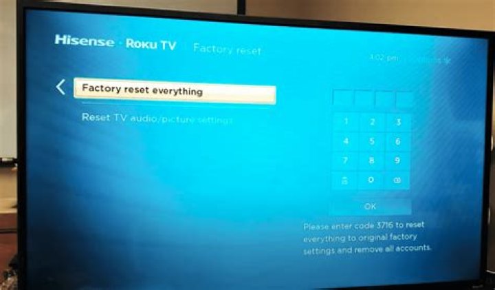 Where is the reset button on a Jensen DVD player?