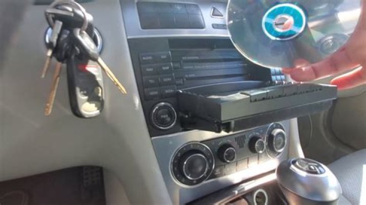 Why do CDs get stuck in car CD players?